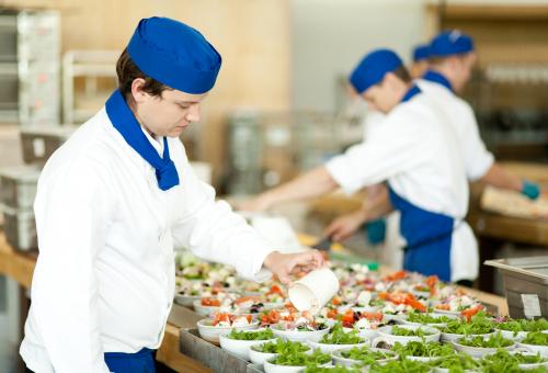chefs preparing salad